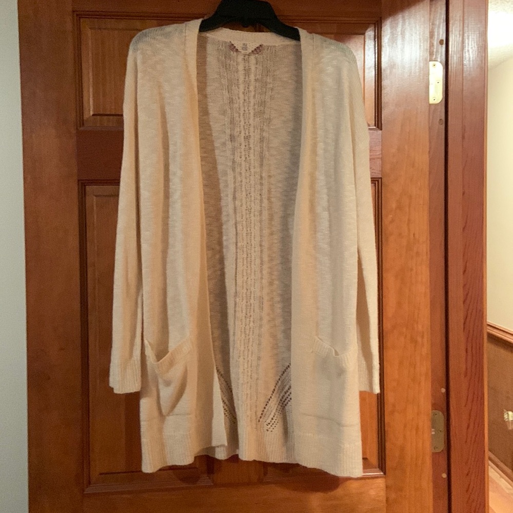 Cute cardigan. Very soft. Hardly ever worn.